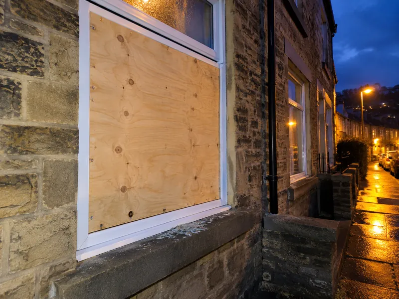 Broken window boarded up securely in Halifax